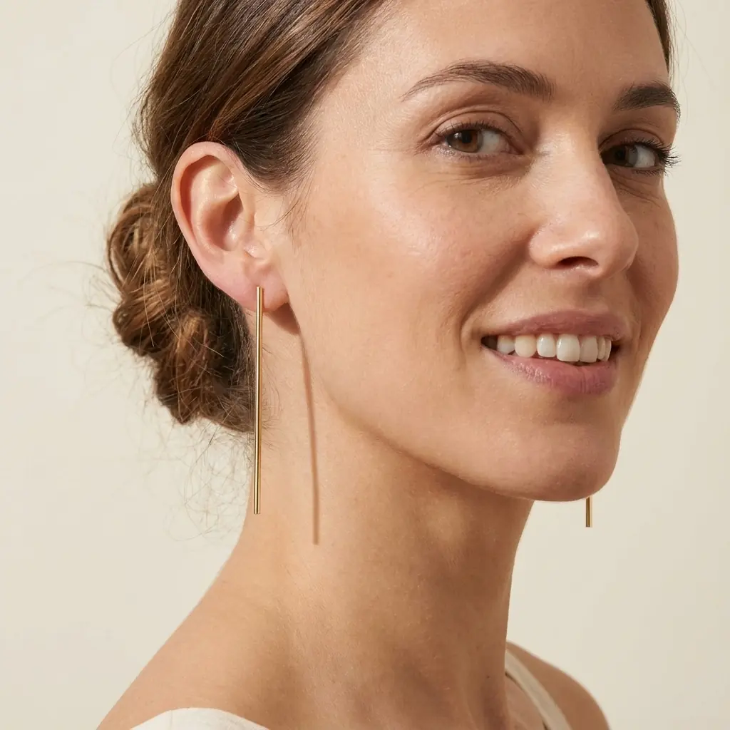 nora_earrings_gold_model_3